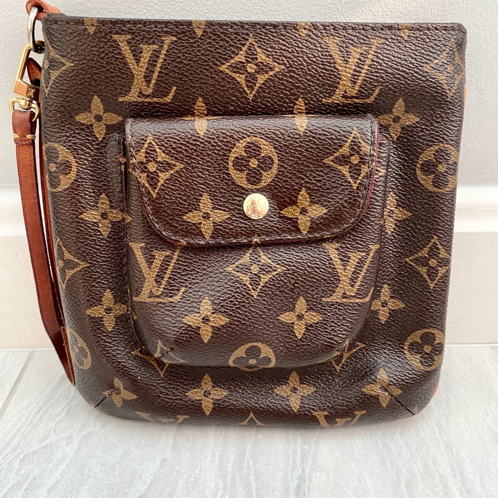 Louis Vuitton small clutch with strap